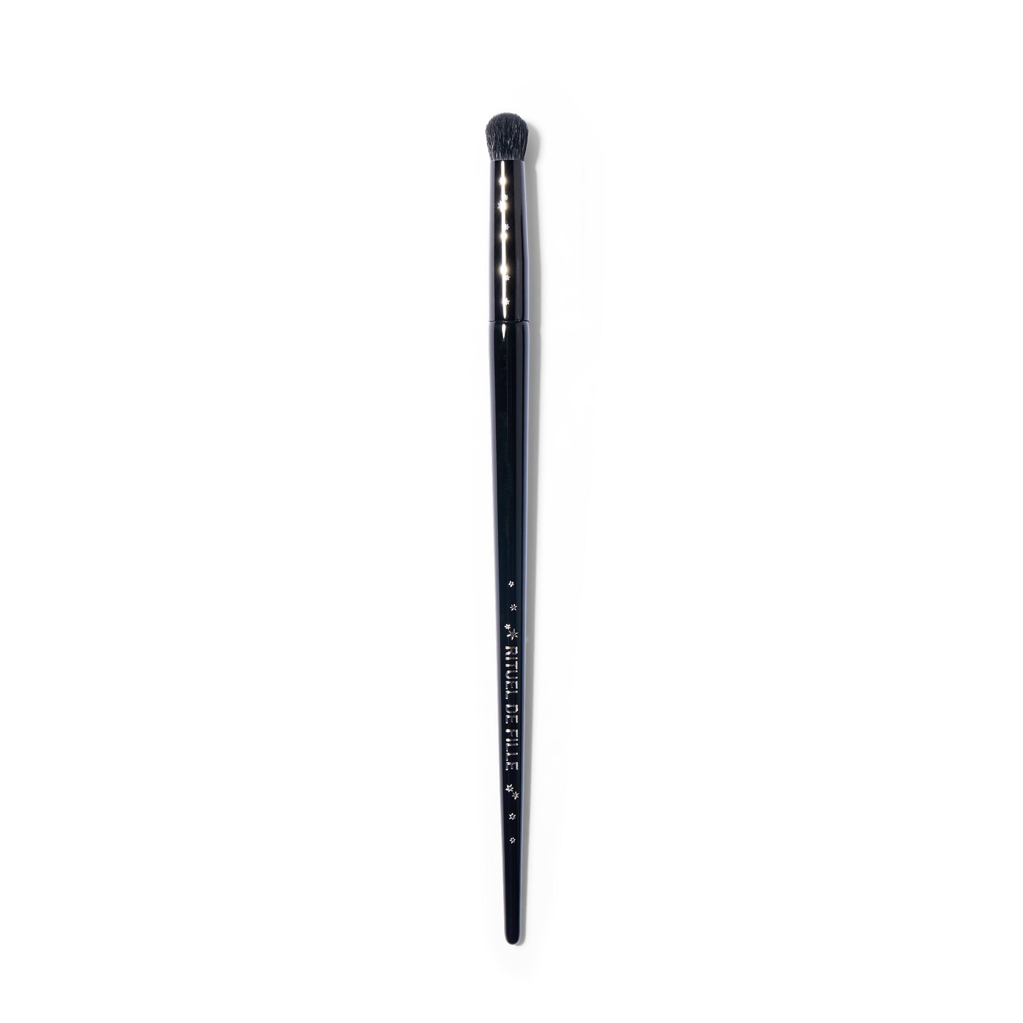 Black makeup brush with silver stars
on a white background