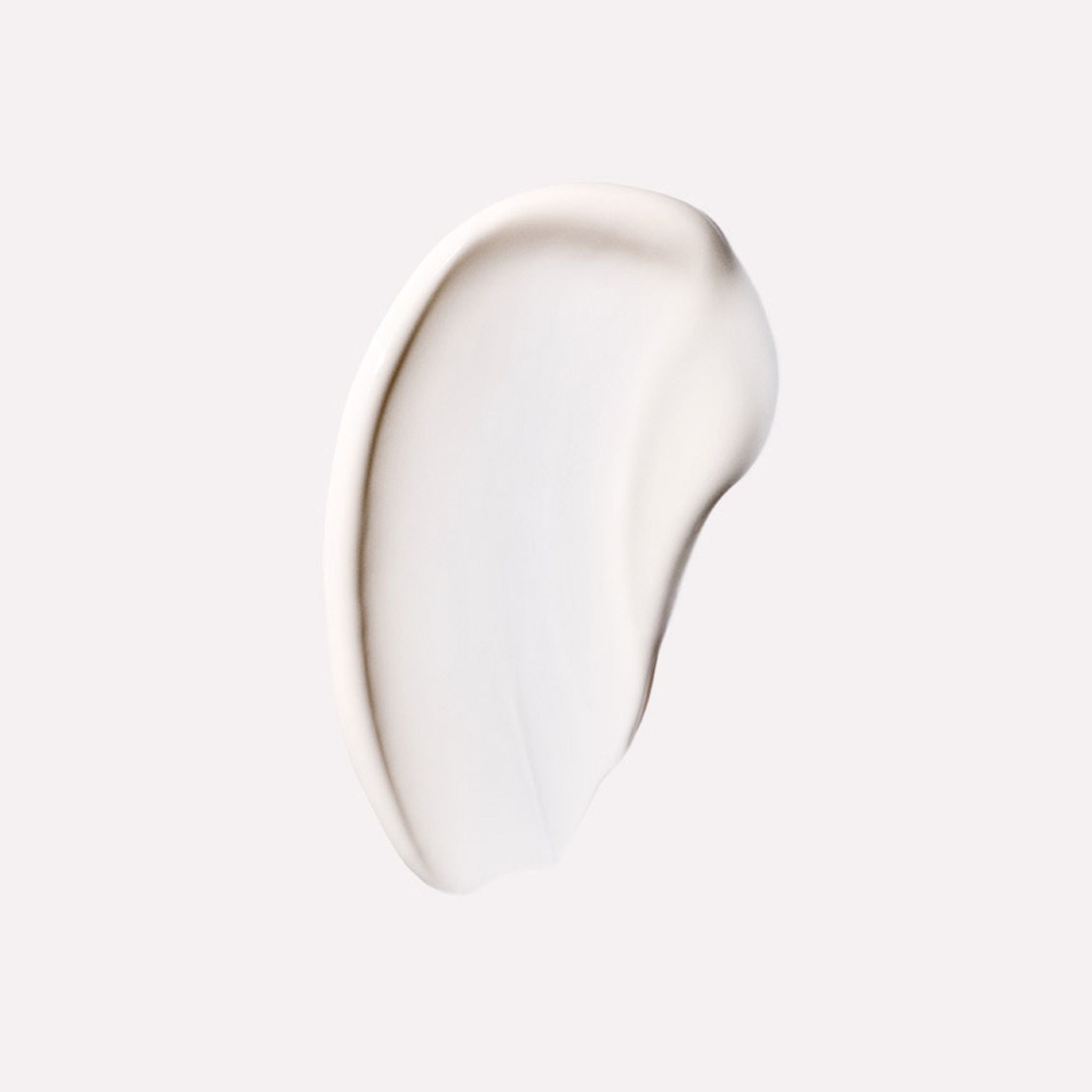 A swatch of light colored cream on a white background.