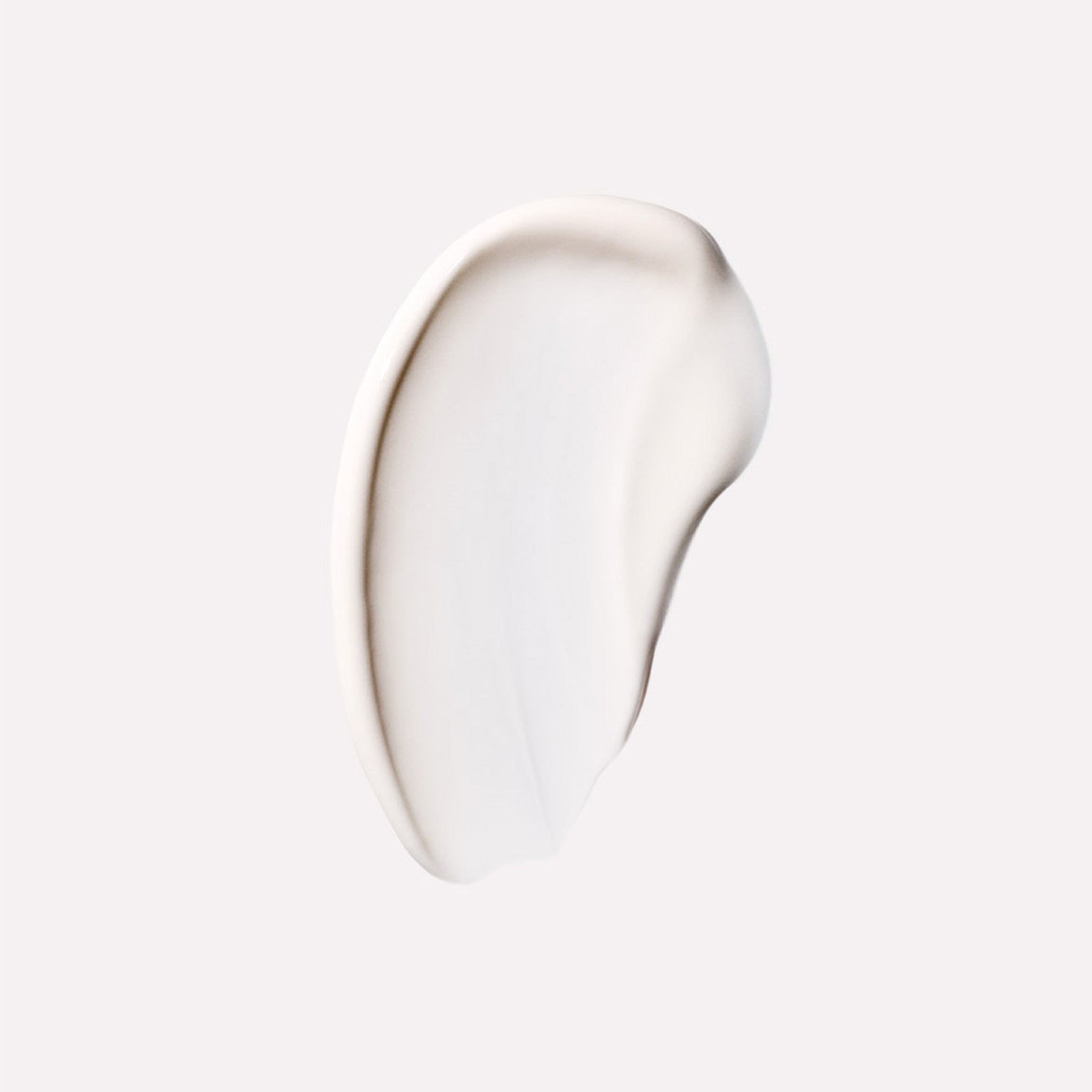 A swatch of light colored cream on a white background.