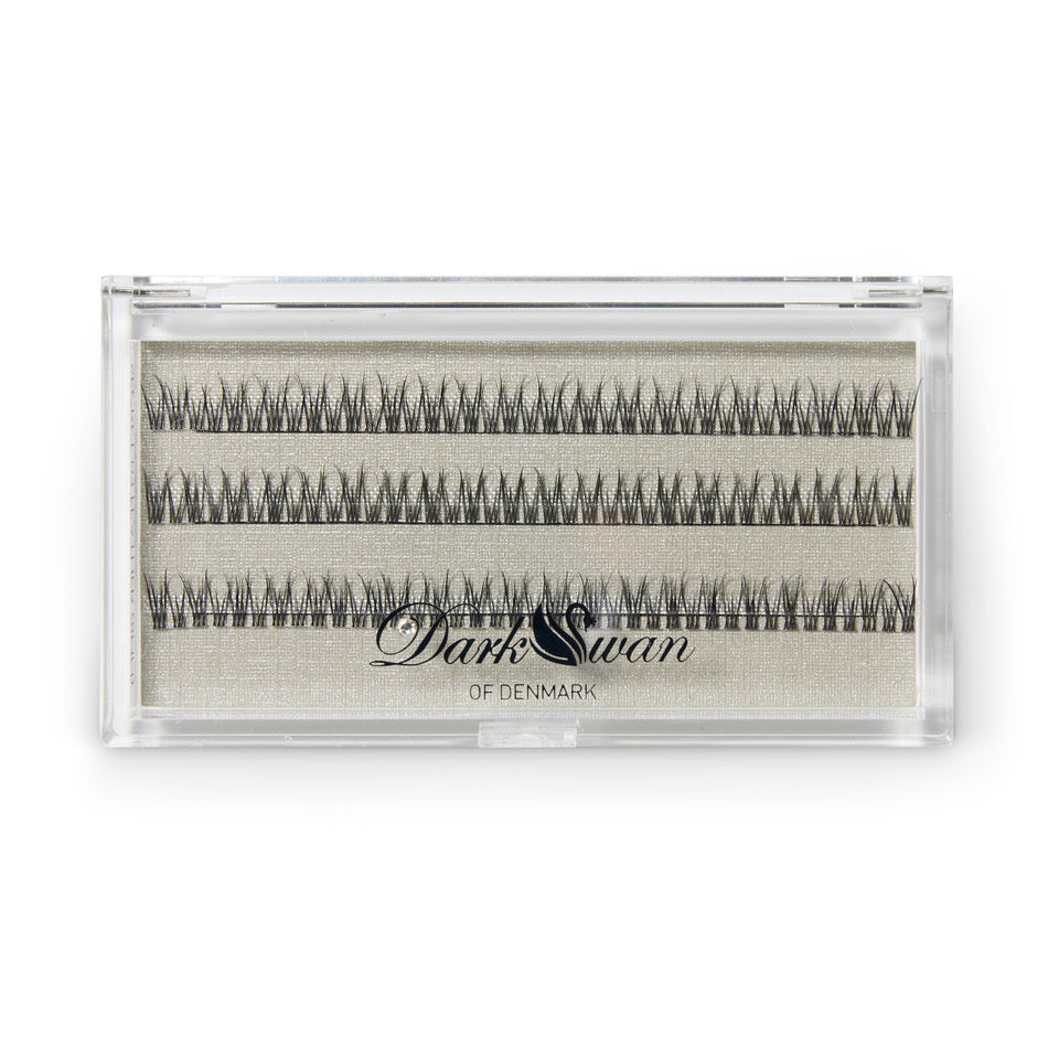 Closed box of eyelash clusters in three rows.