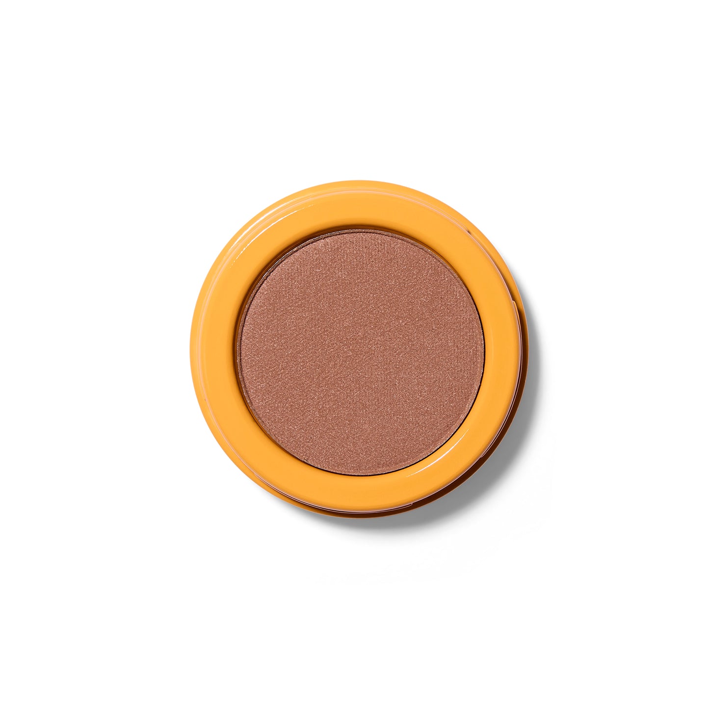 A nutmeg colored pressed eyeshadow in a yellow component.