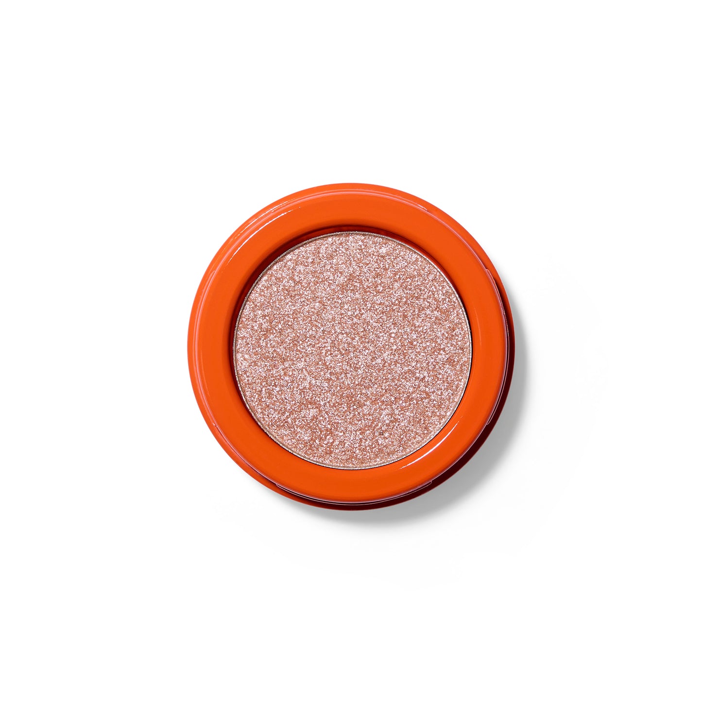 A shimmery pale pink pressed eyeshadow in an orange component.