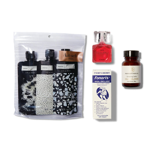Grouping for The Jetsetter Set which includes the Kitsch Refillable Travel Pouches, Calm Balance Smelling Salts from Persephenie, Sante Beauteyes eye drops and Ponaris Nasal Emollient.