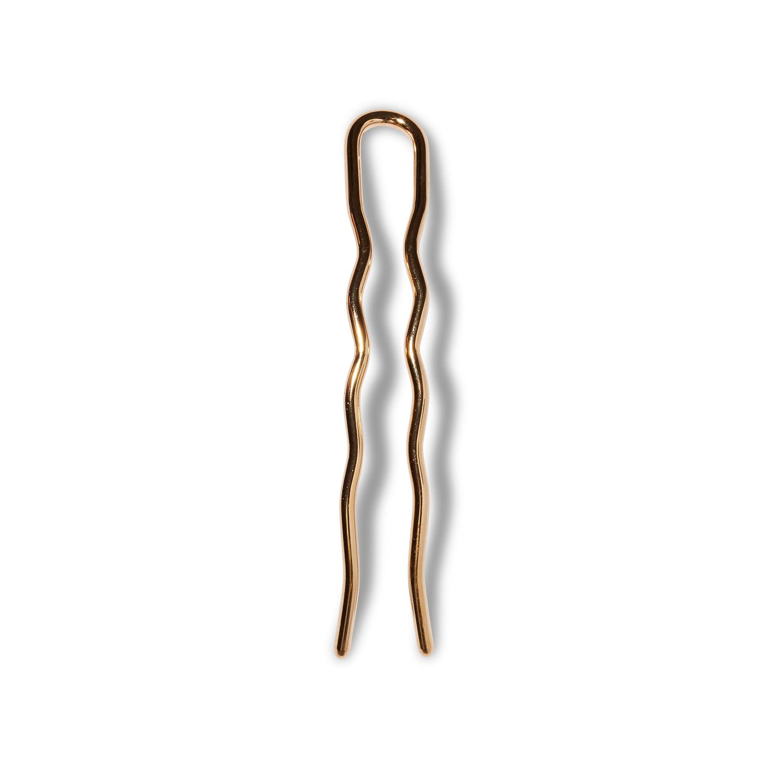 A 4" 22k gold plated metal U shaped hair pin with slightly wavy tines.