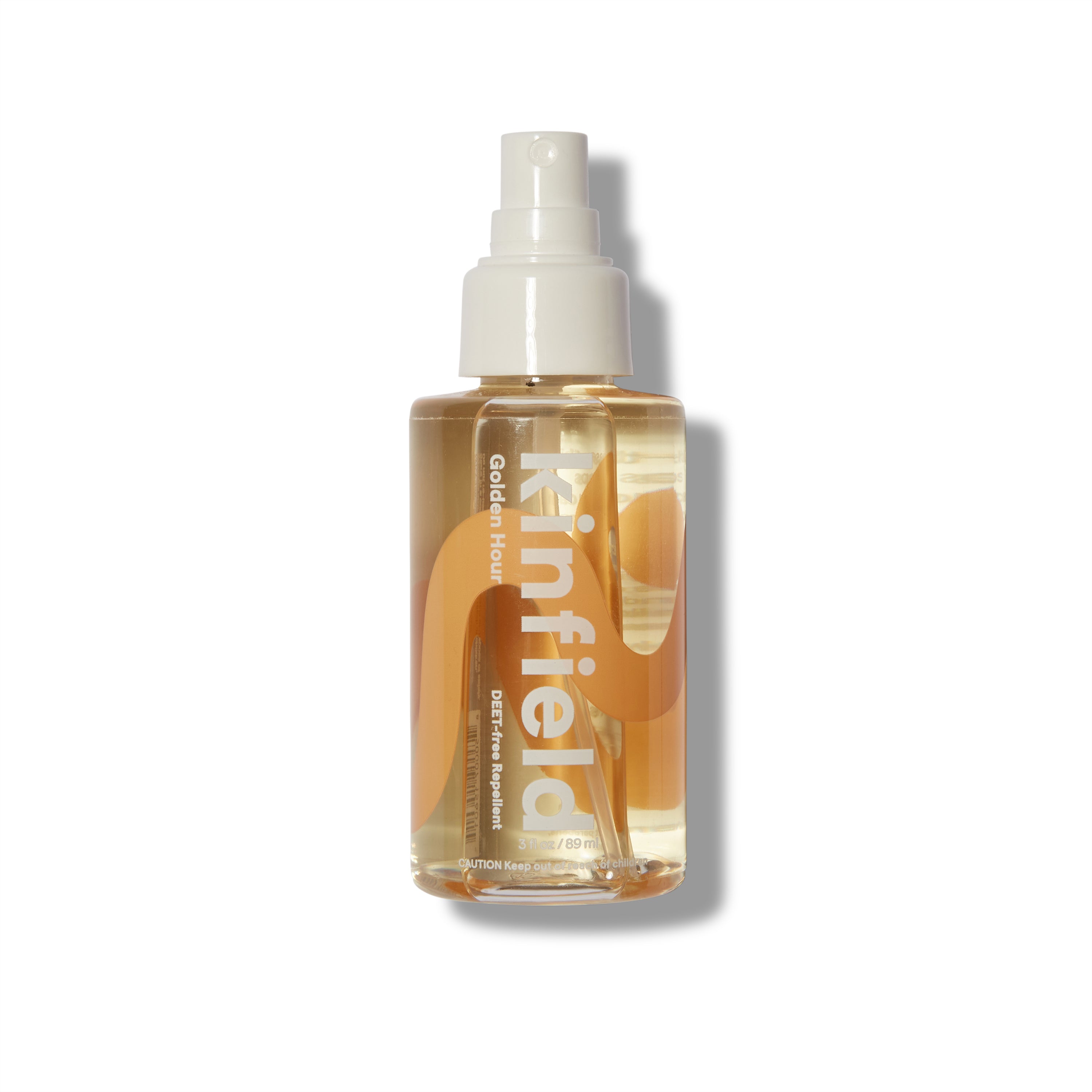Clear bottle of the Kinfield Golden Hour Insect Spray.