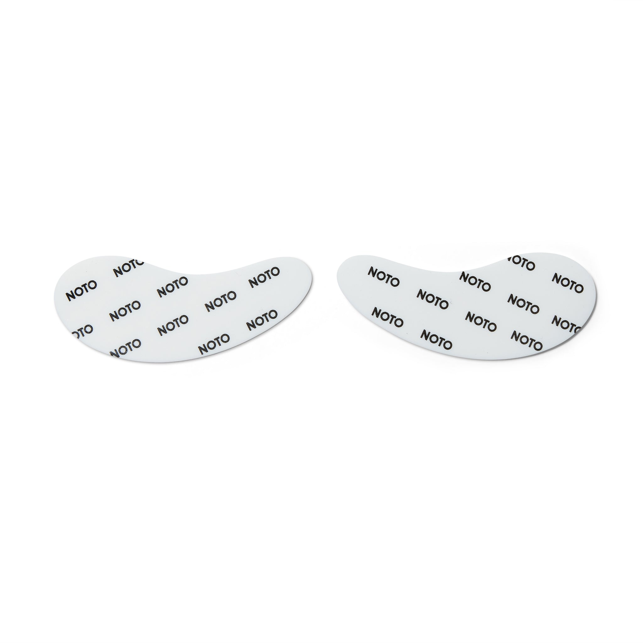 White tear drop shaped eye patches with Noto written on them in black capital letters.