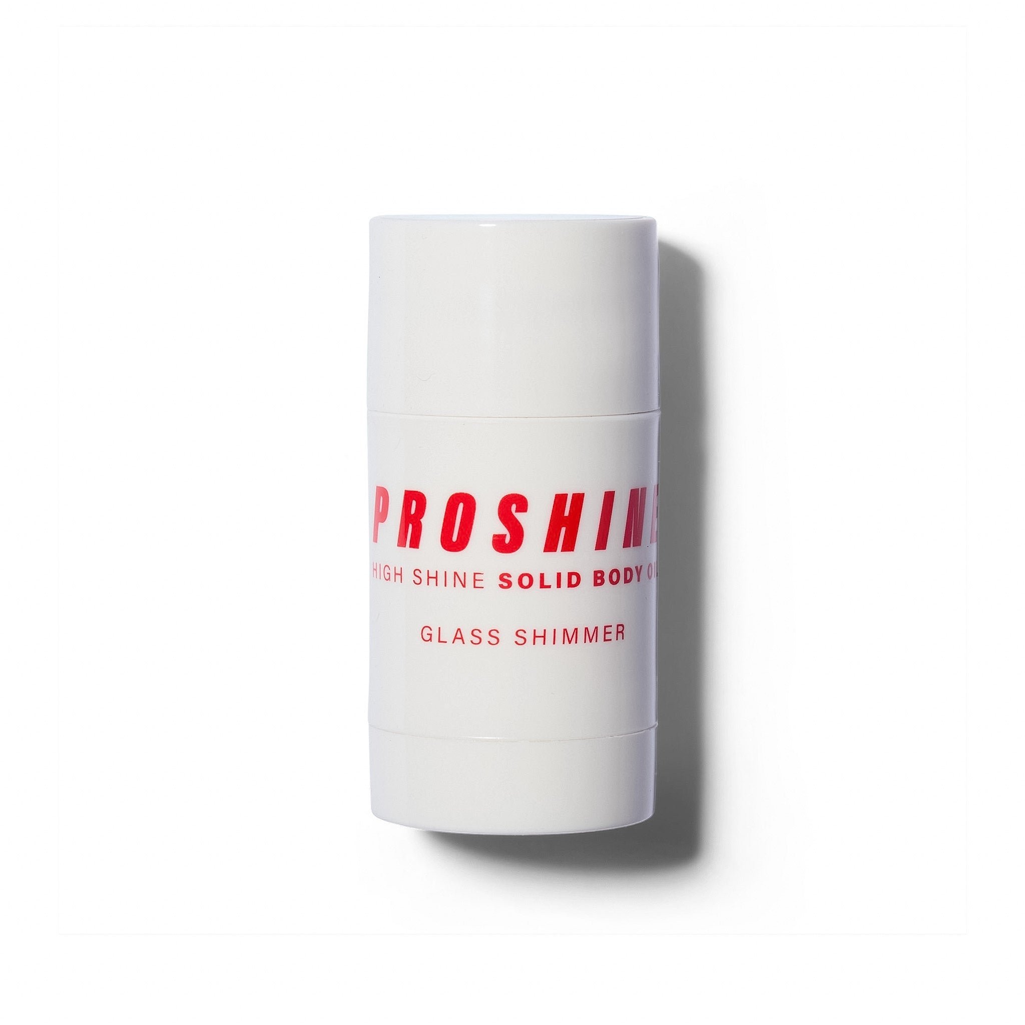 A white cylindrical solid body spray container with red text reading 'PROSHINE HIGH SHINE SOLID BODY SPRAY' and 'GLASS SHIMMER' on a white background.