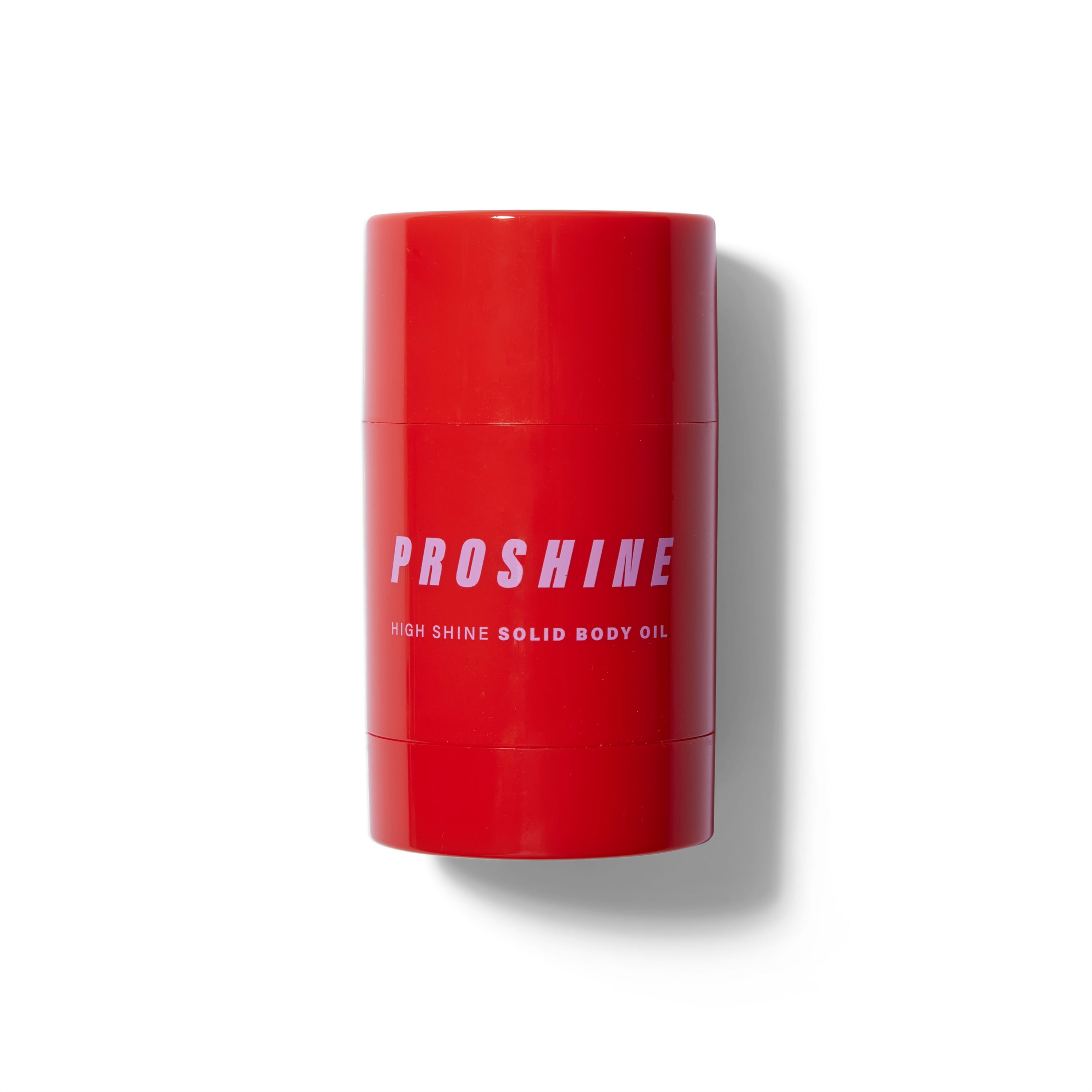 Front view of the Proshine Solid Body Oil. The packaging is a shiny red cylinder with light lavender text.