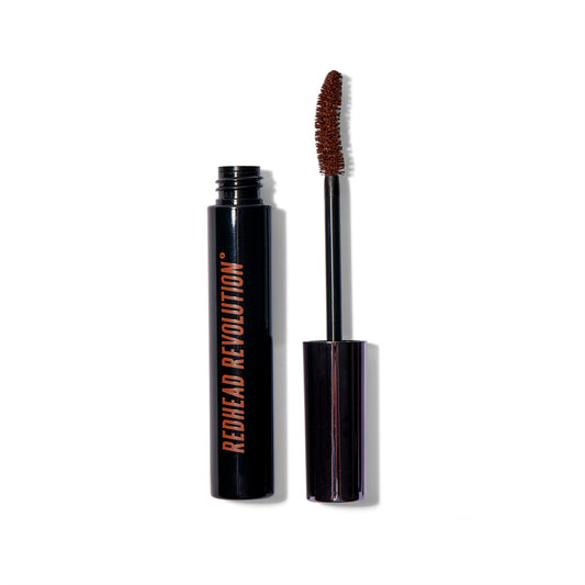 The Redhead Revolution Gingerlash Mascara wand to the right of the open component.