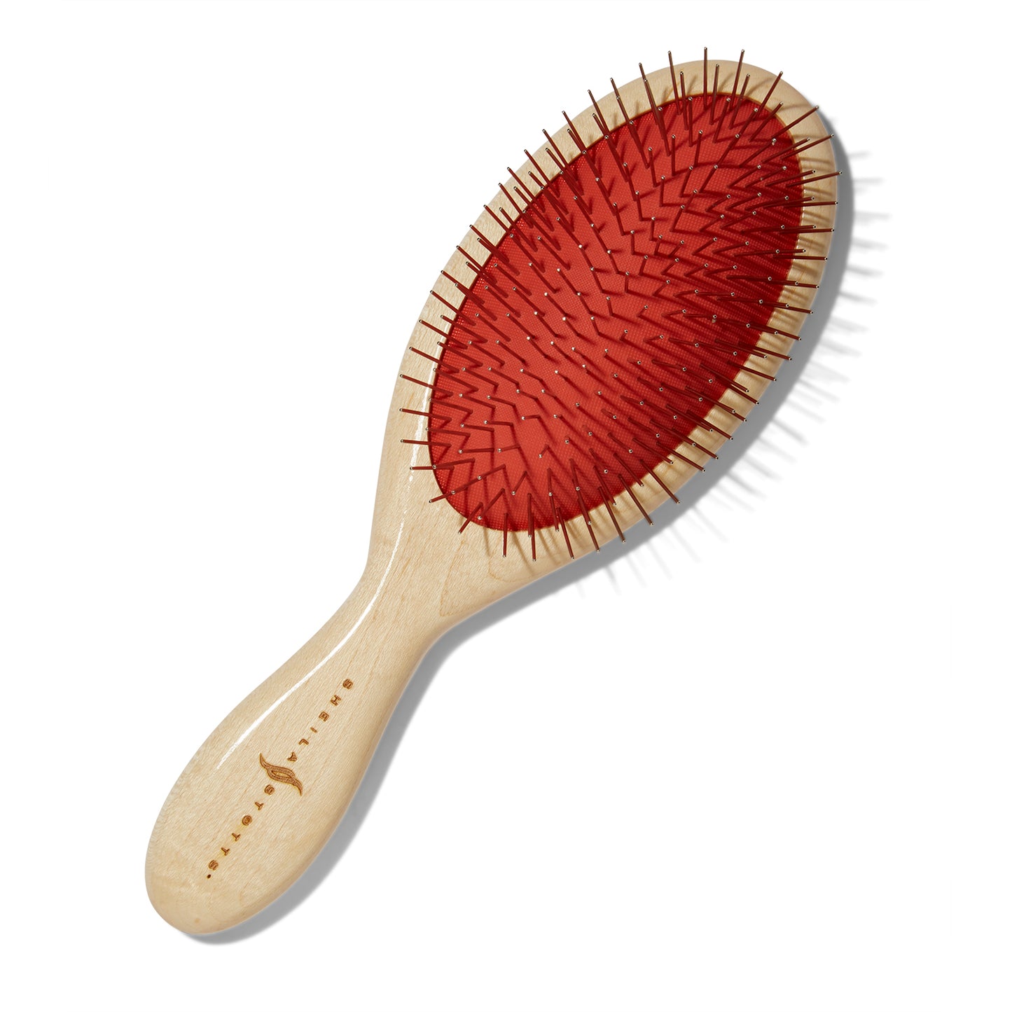 Front view of the Sheila Stotts Full Size Untangle Hair Brush. The handle is a light wood, the tines are silver metal and the rubber the times are embedded in is deep pink.