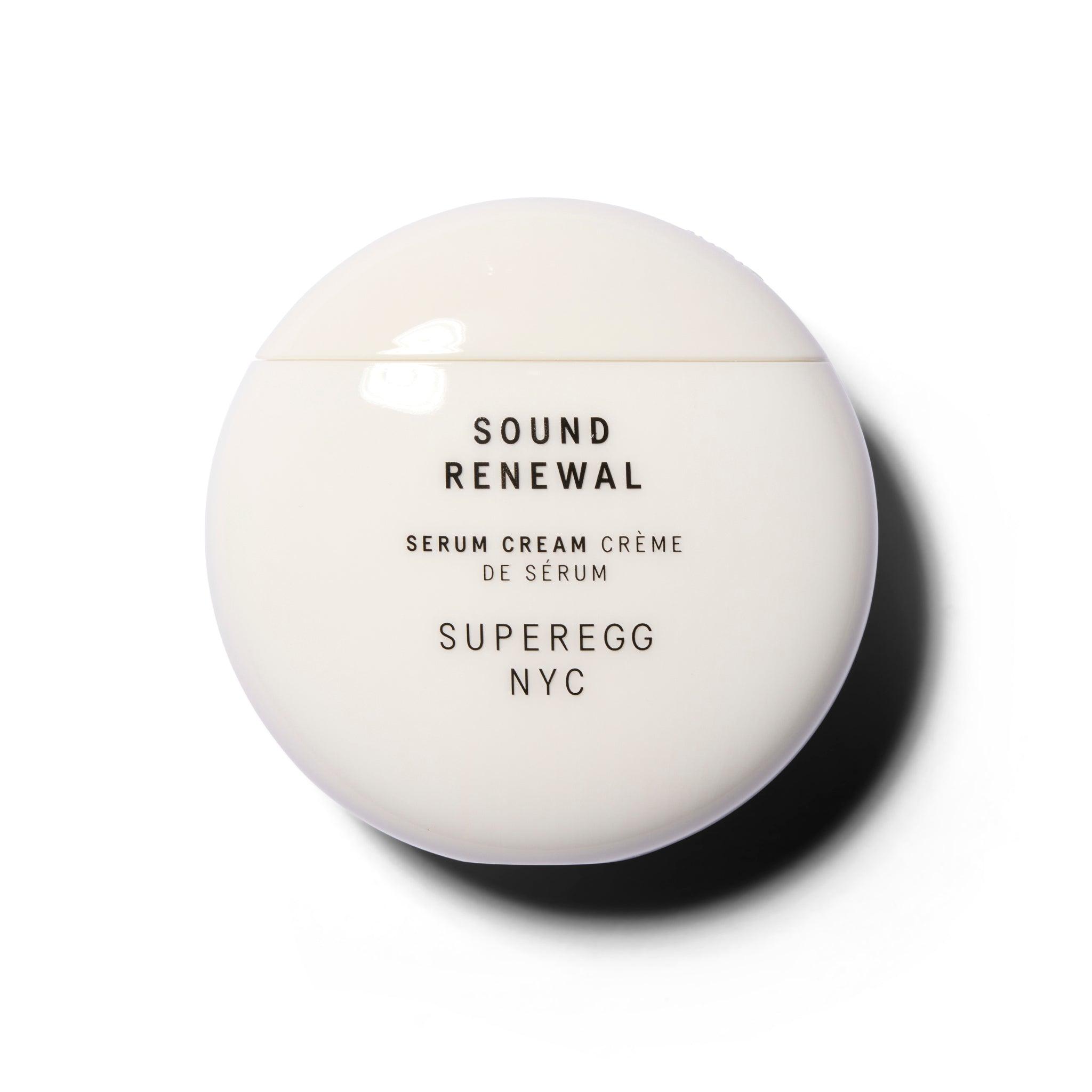 A white perfectly round component with black text.