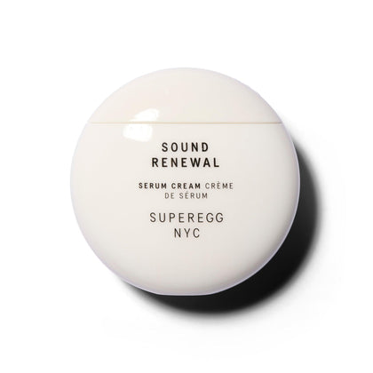 A white perfectly round component with black text.