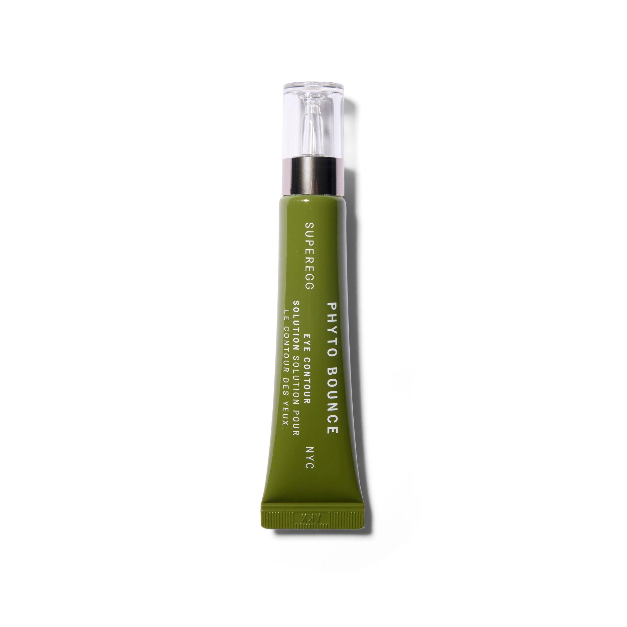 A green tube with white text and a clear cap.