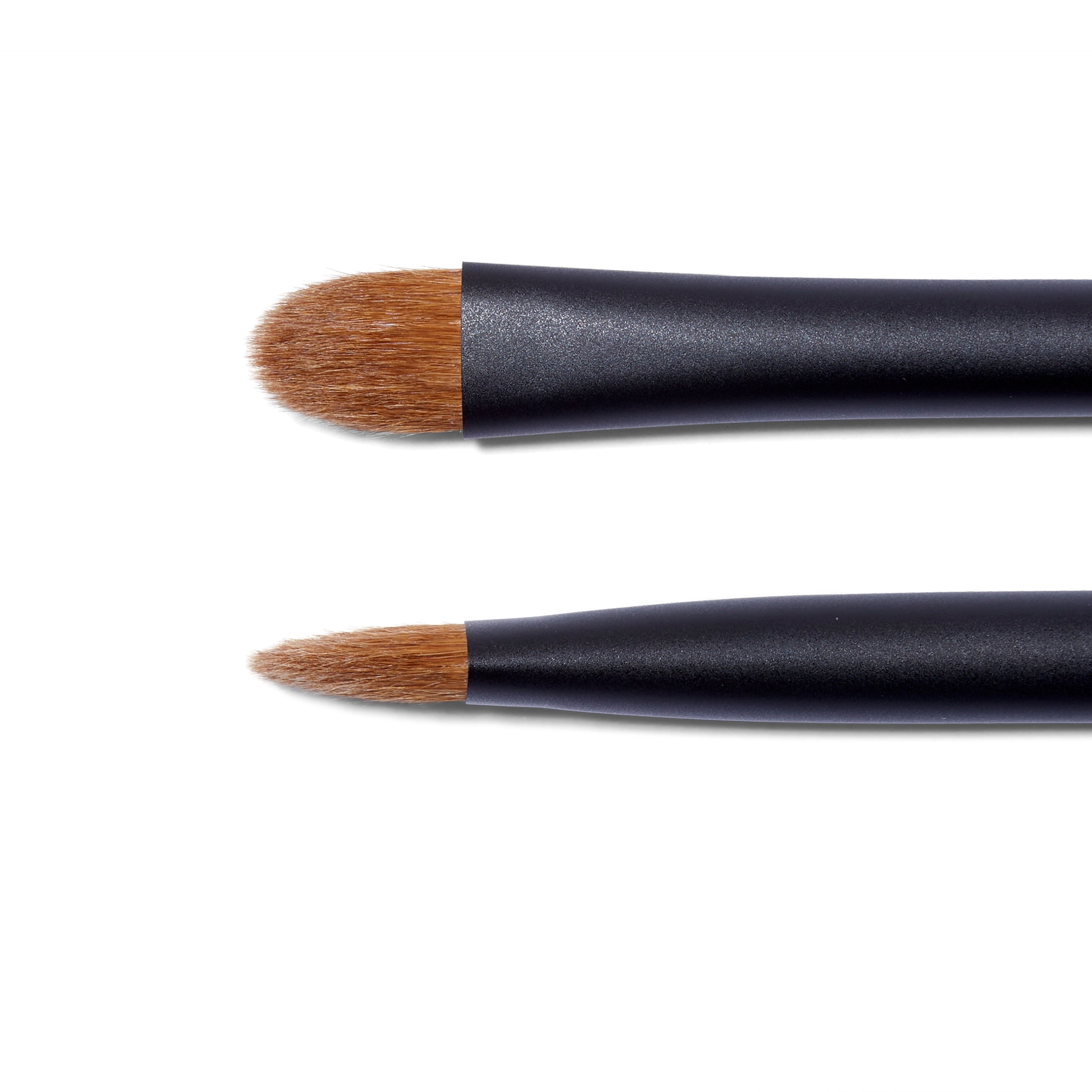 Side view and front view close ups of the Surratt Perfectionniste Complexion brush. The natural bristles are brown and in a soft curved taper.