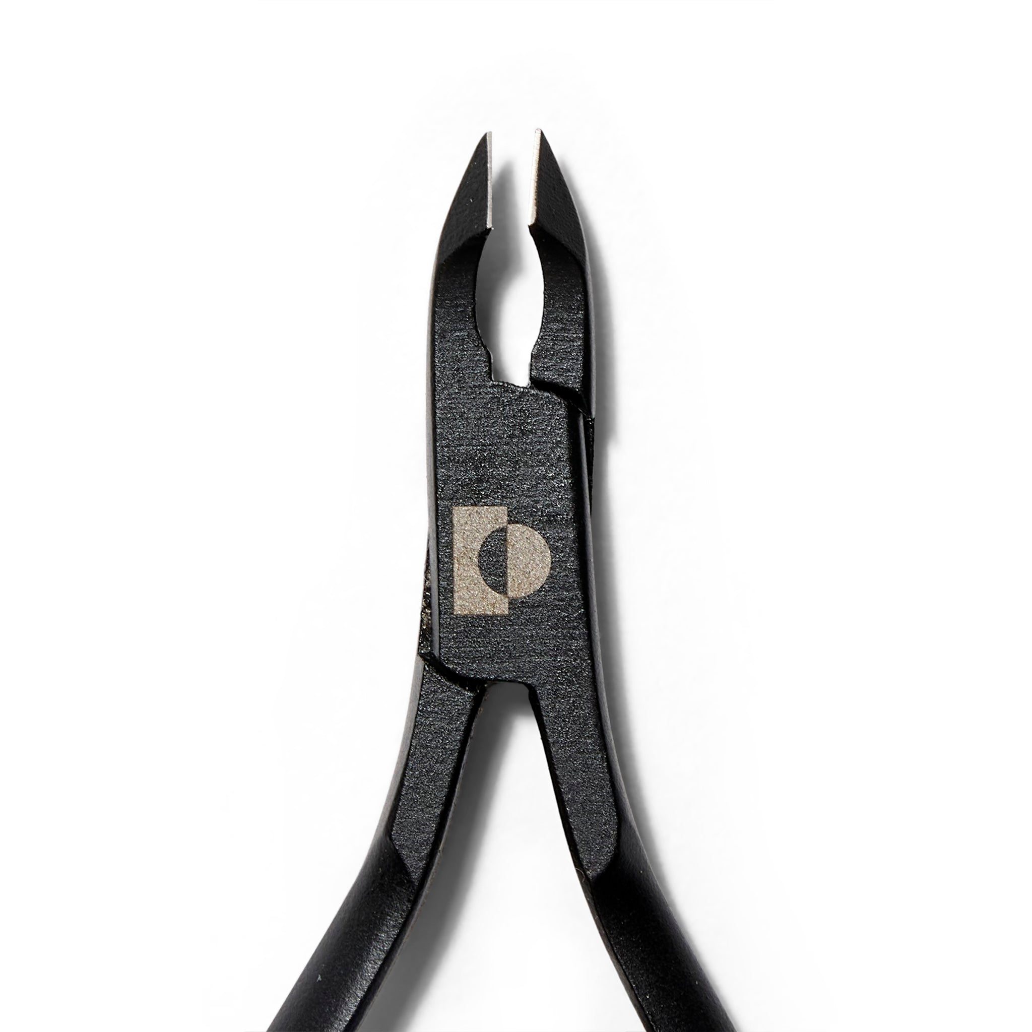 Close up view of matte black steel cuticle nippers. The blades are slightly open.