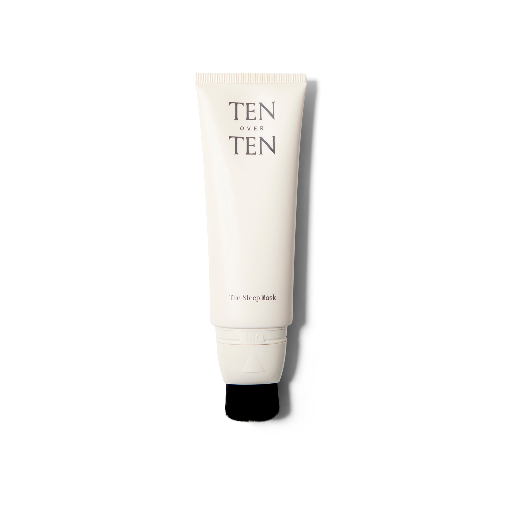 Front view of The Sleep Mask from ten over ten. The cap is off and the black brush tip is visible.