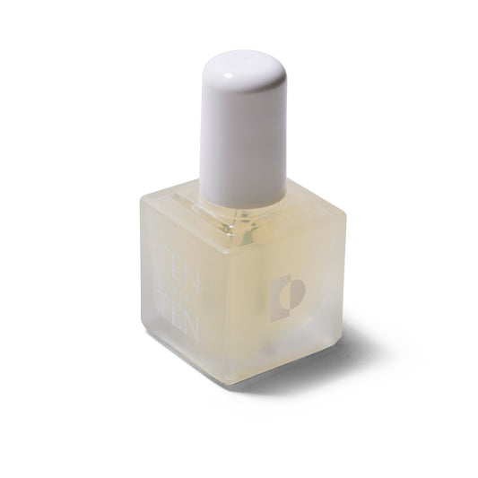 Side view of the Rehab Intensive Care Nail Primer. The cap is white and the bottle is frosted glass. 