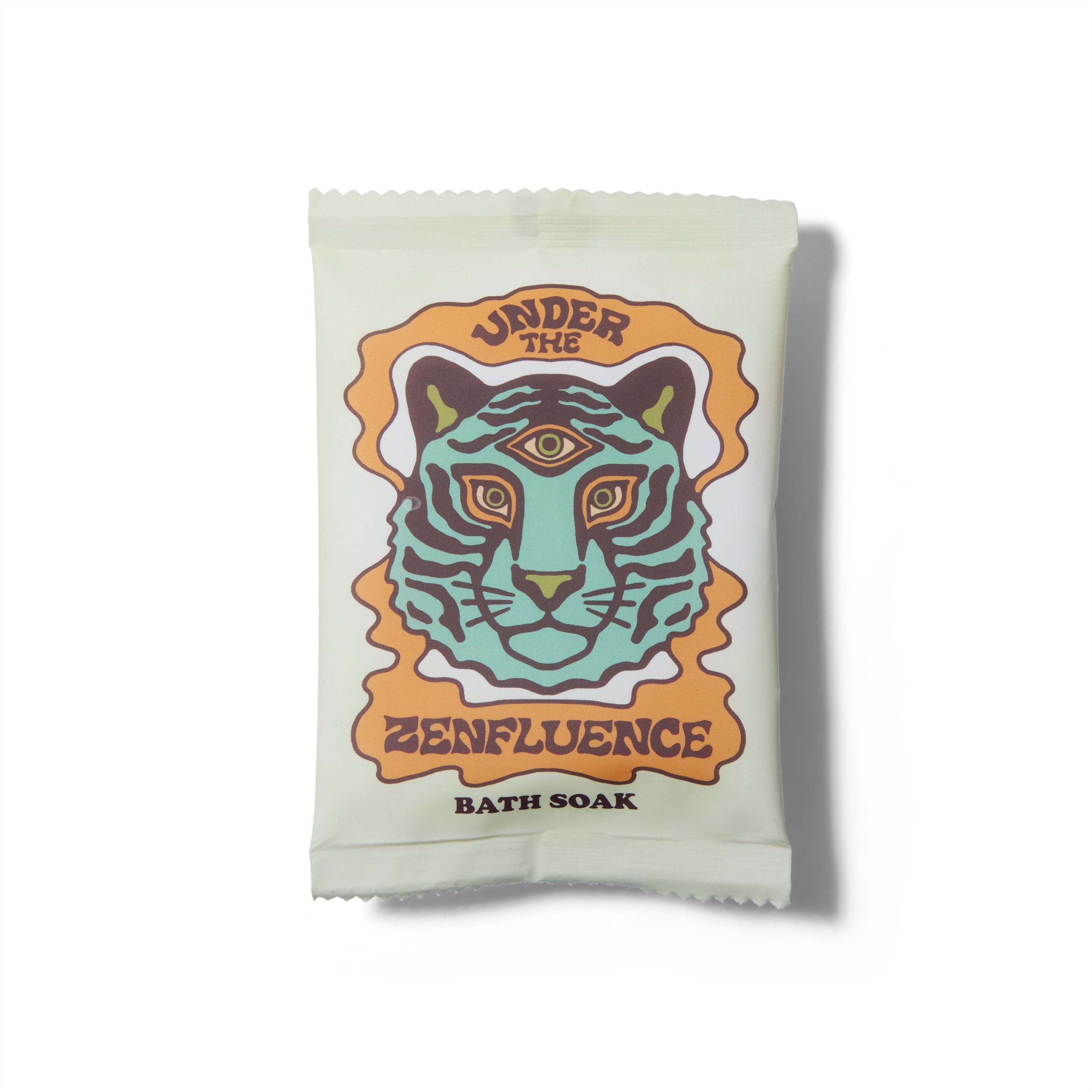 The Wild Yonder Organic Bath Salts in Under The Zenfluence. There is an illustration of a three eyed tiger on the package.
