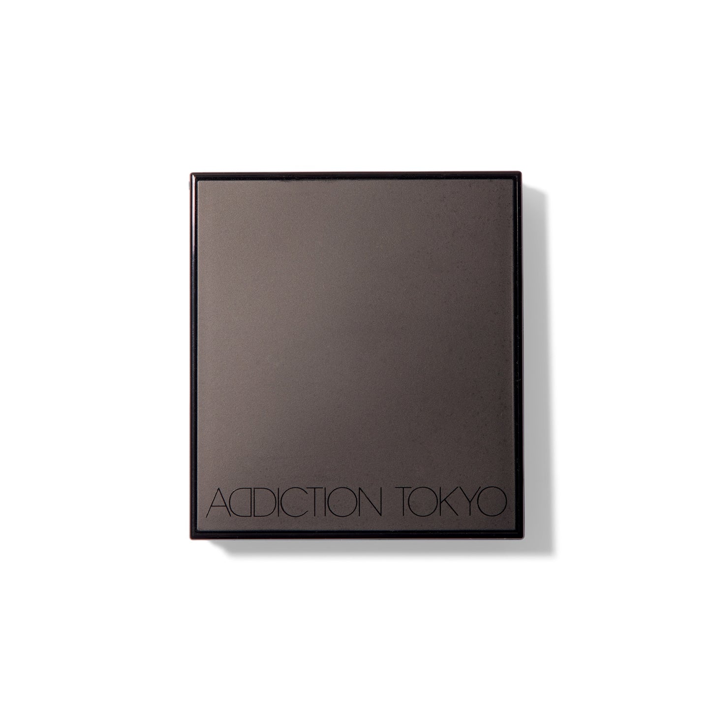 The black Compact Case I, closed, with Addiction Tokyo logo on the front. 