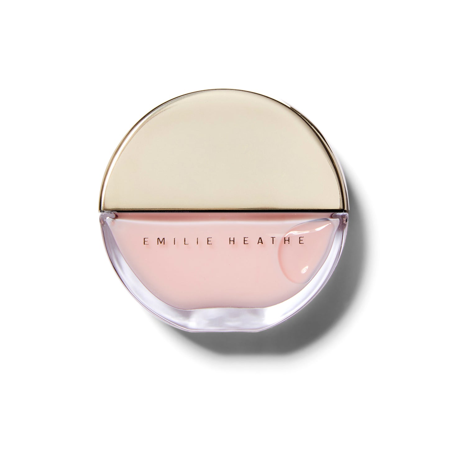 Front view of the Emilie Heathe Artist Nail Polish in Macaron. The glass bottle is round with a gold top.
