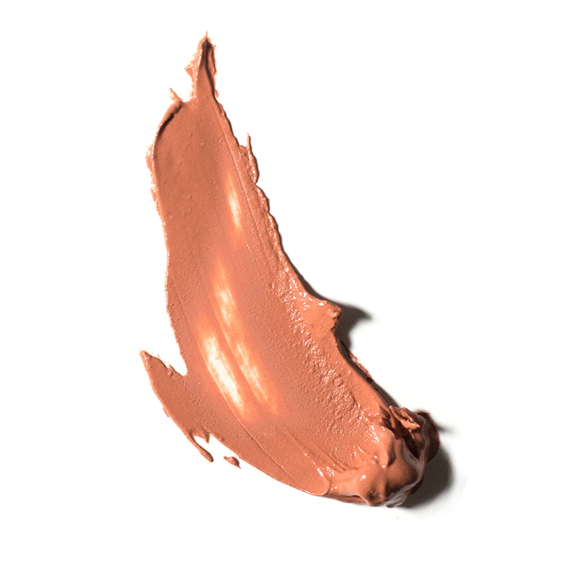 A swatch of the Ere Perez Carrot Colour Pot cream blush in Healthy, a soft peach shade. 