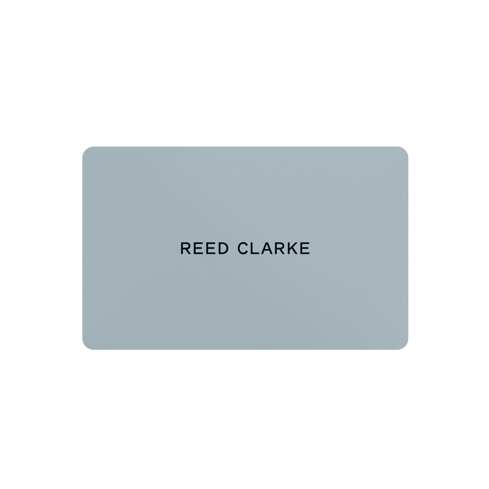 Reed Clarke gift Card. Blue credit card shape with Reed Clarke written in all caps.