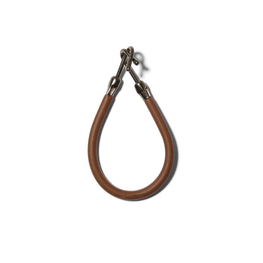 The Reed Clarke brown silicone hair bungee with steel hooks on either end. 
