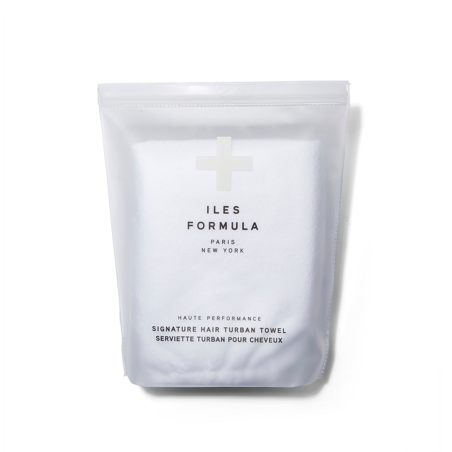  Iles Formula Signature Hair Turban Towel in white in it's packaging.
