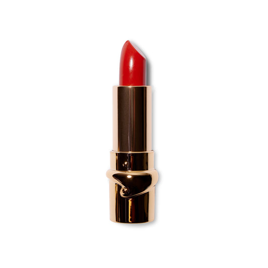 The Julie Hewlett matte Noir lipstick in Belle is wound up and the bullet is visible in the gold component. 