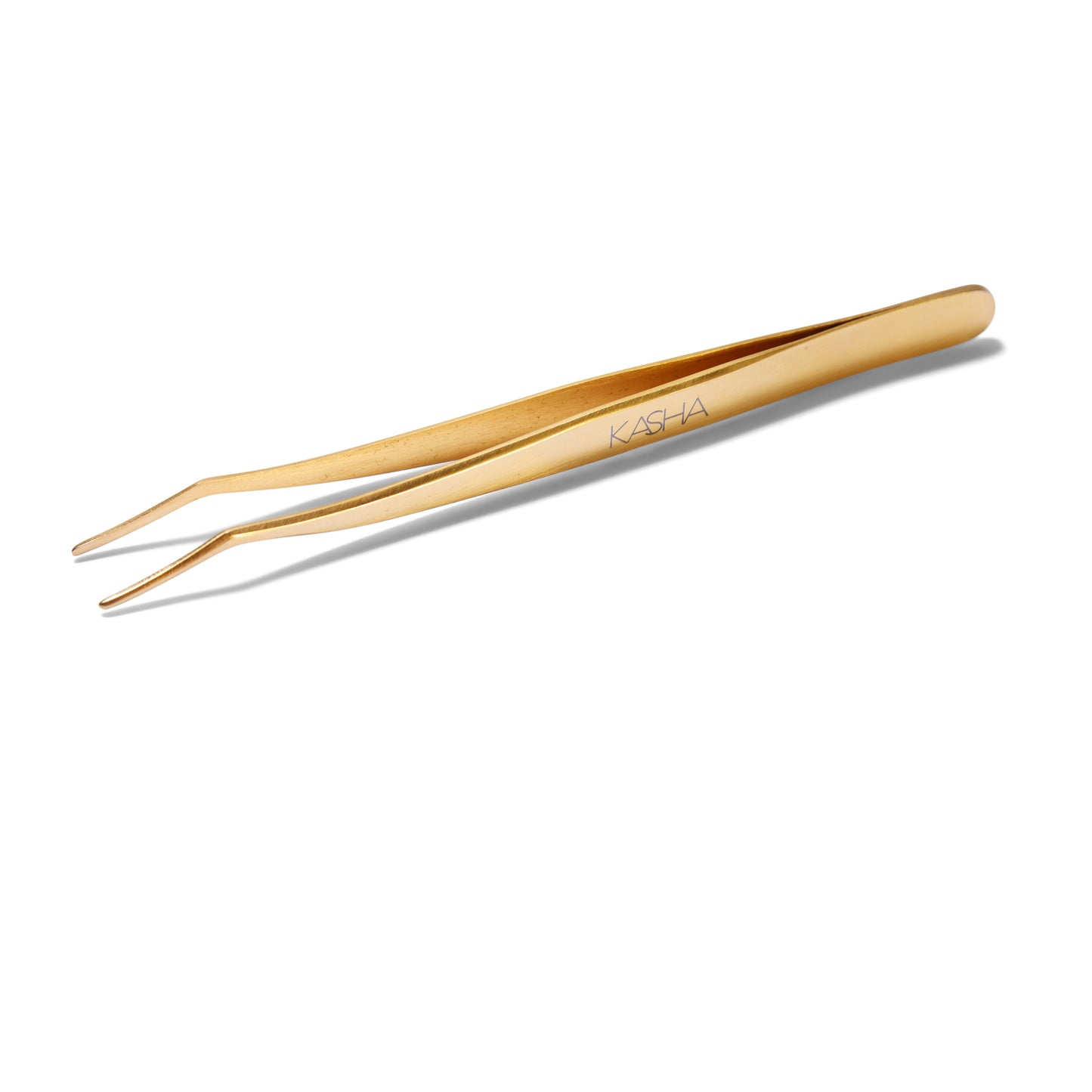 Side view of the gold Kasha Eyelash Applicator. The applicator is gold and the tip is angled.