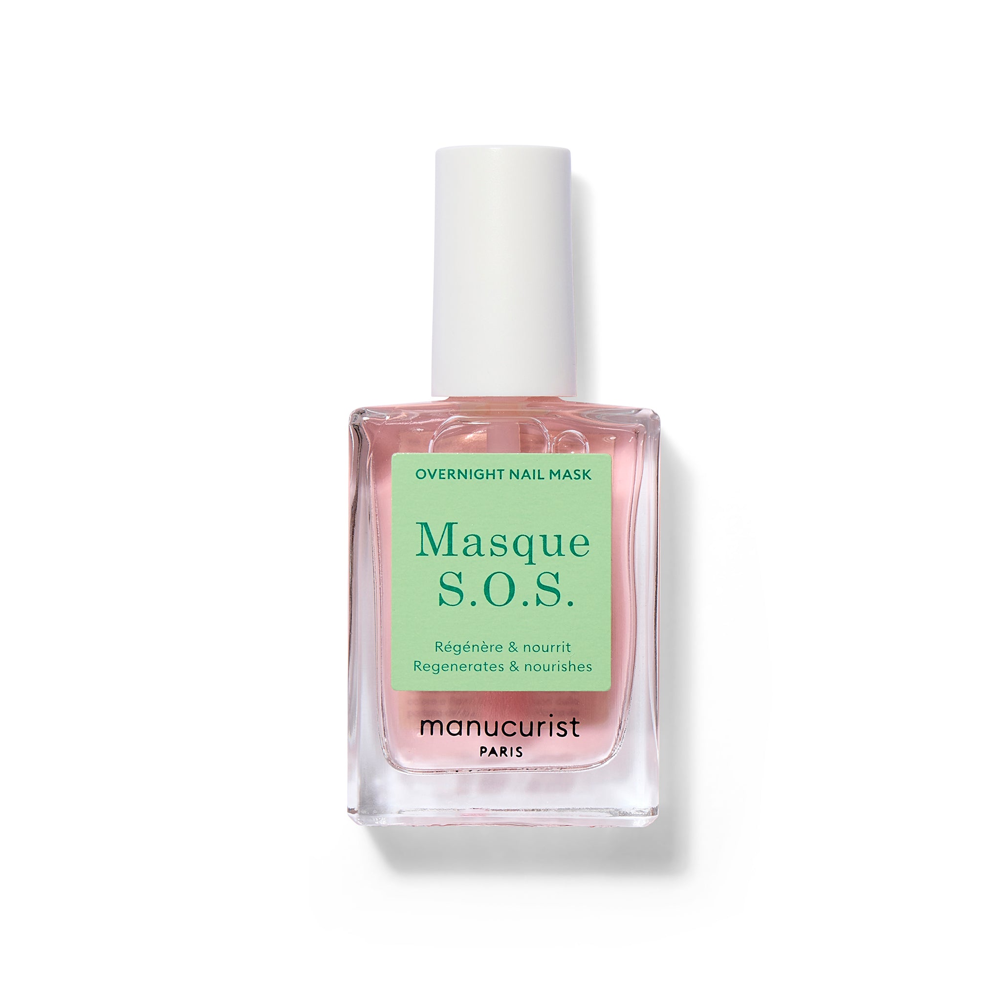 A clear nail polish bottle with a green label and pale pink liquid that is a healing mask for nails. 