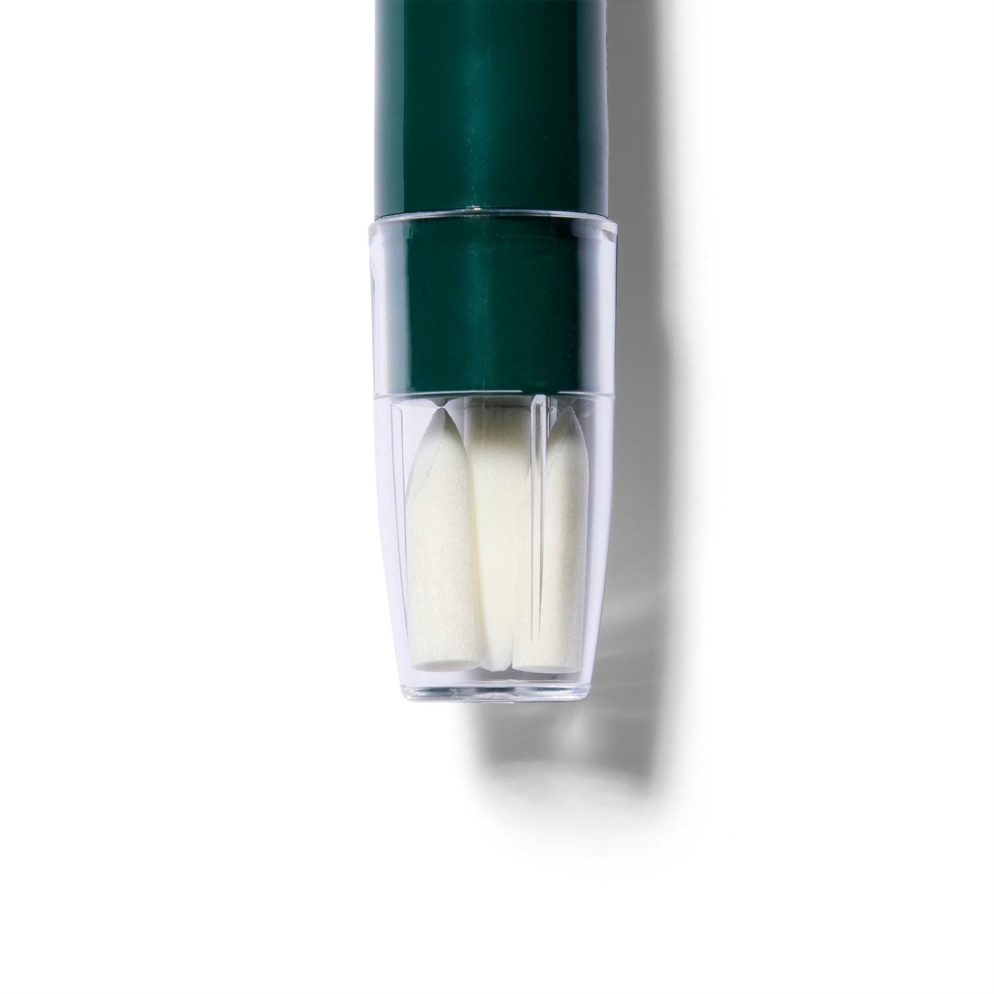 A close up of the clear cap with the three extra removal nibs stored in it. 