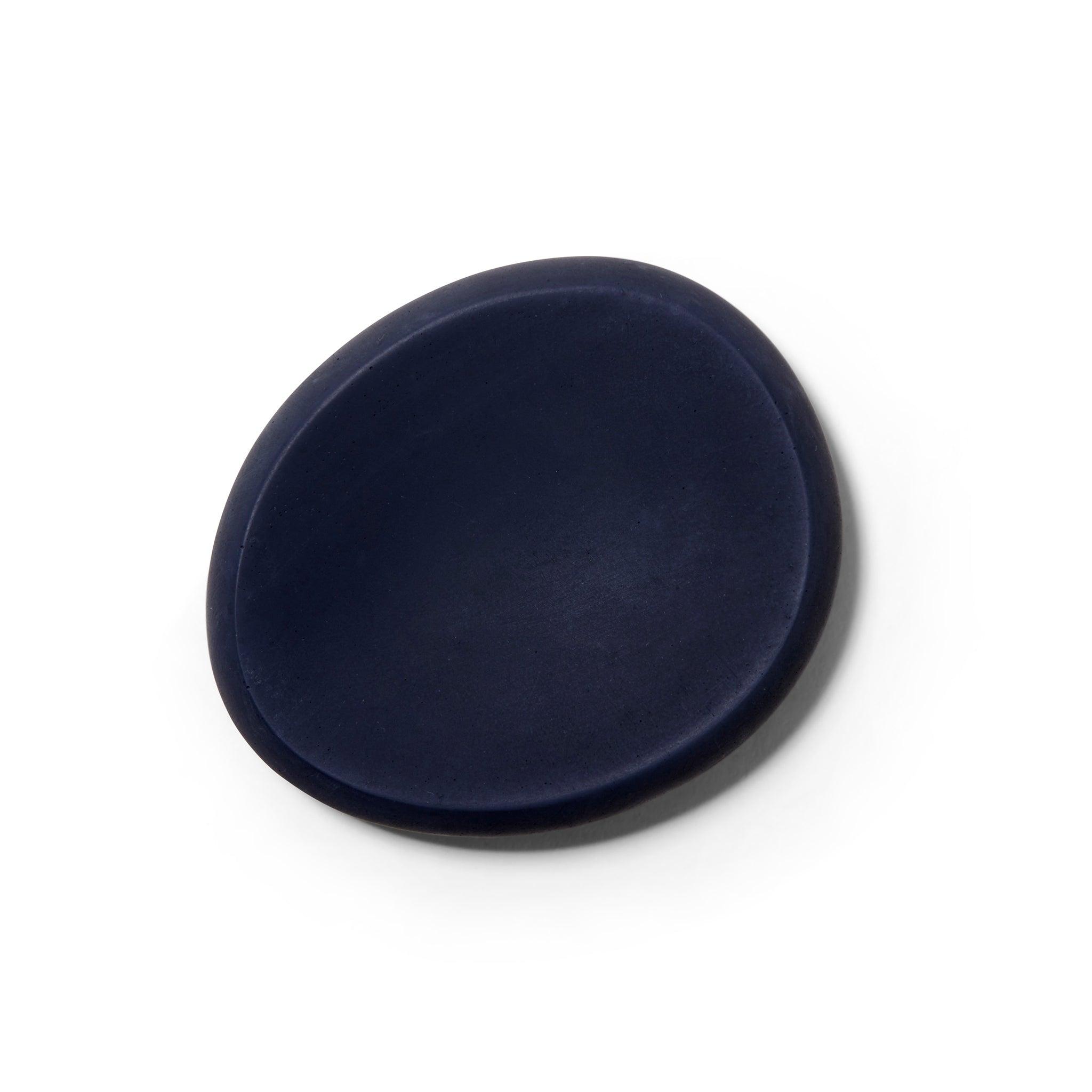 Top view of The Mitmo concrete soap dish matte black concave dish.