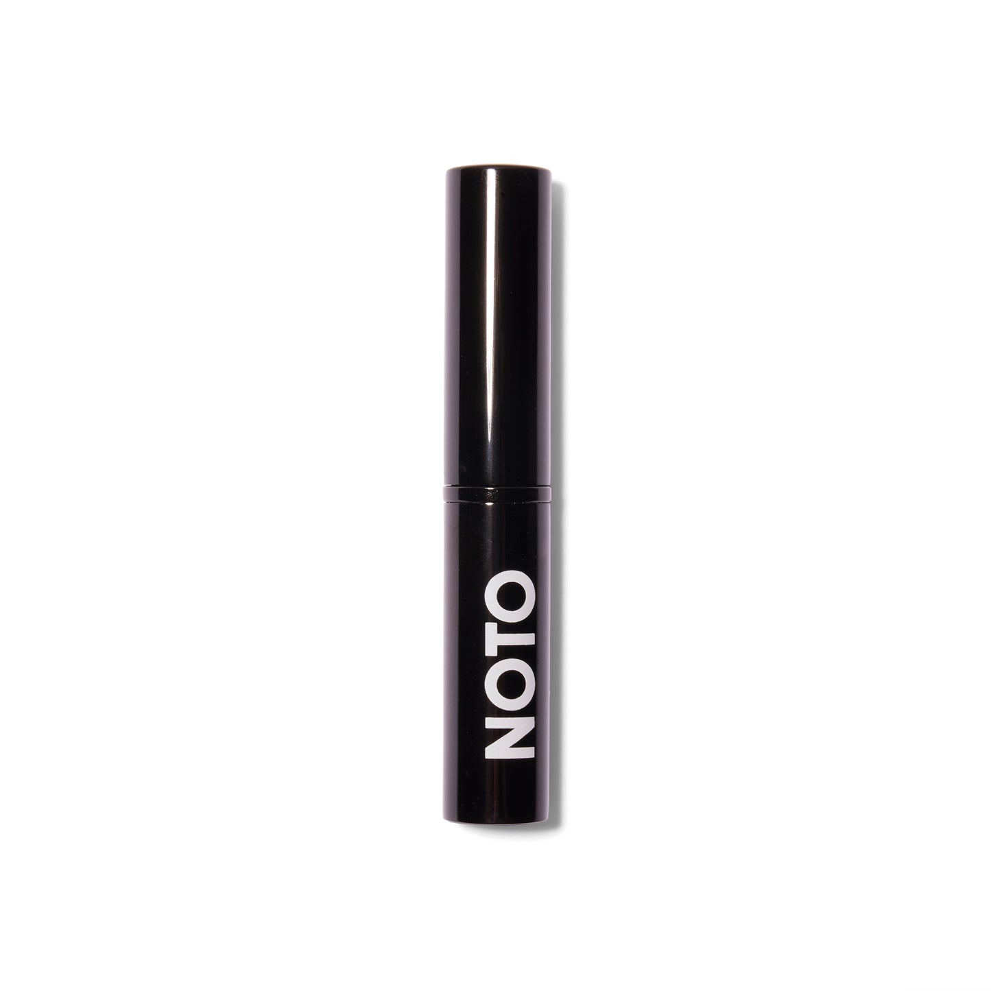 Front view of the Noto Organics Hydra Highlighter. The component is black with a white logo and the top is on the tube. 