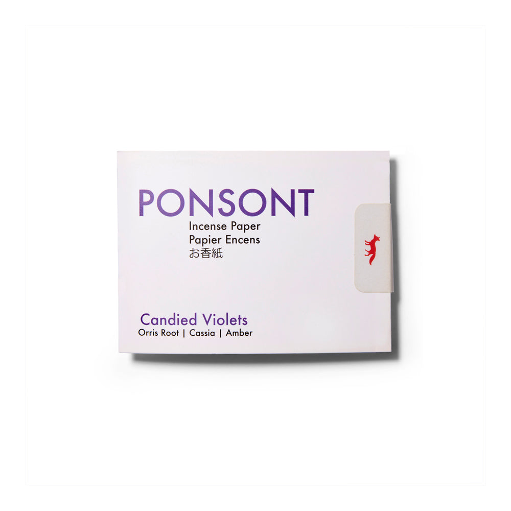 Booklet of the Candied Violets Ponsont Incense Papers. It's a white small paper booklet with purple text.