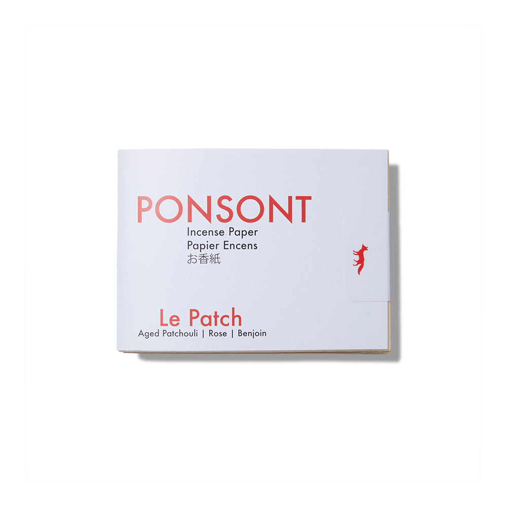 Booklet of the Le Patch Ponsont Incense Papers. It's a white small paper booklet with red text.