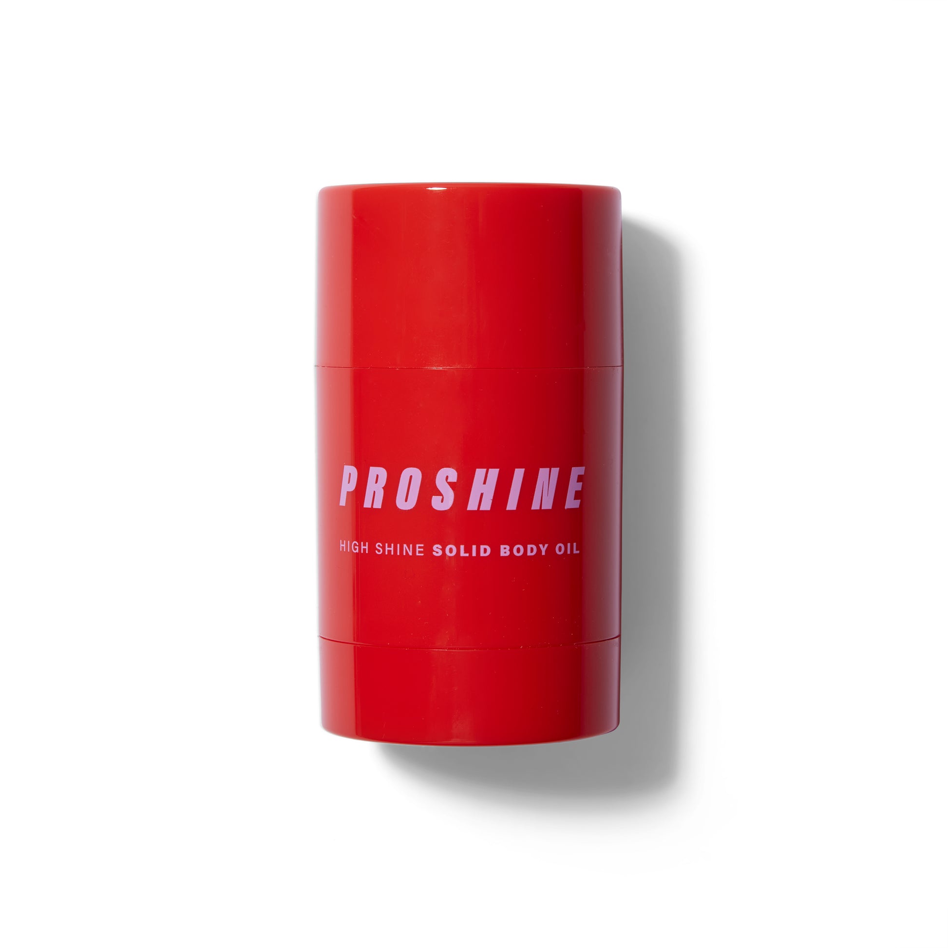 Front view of the Proshine Solid Body Oil. The packaging is a shiny red cylinder with light lavender text. 