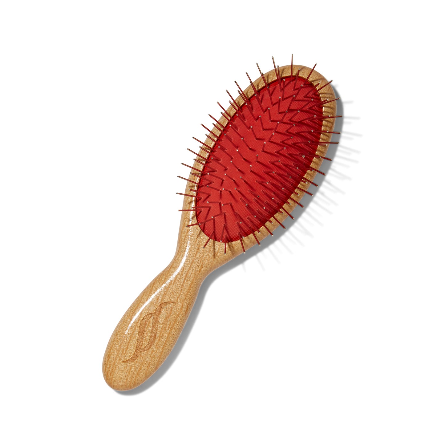 Front view of the Sheila Stotts Travel Size Untangle Hair Brush. The handle is a light wood, the tines are silver metal and the rubber the times are embedded in is deep pink.