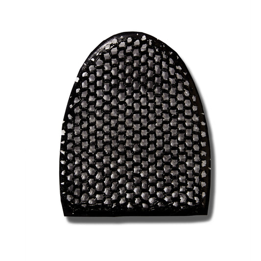 Stimulite Black & White striped honeycomb silicone facial exfoliating mitt.  The honeycomb is black on this side. 