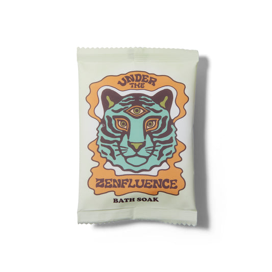 The Wild Yonder Bath Soak Salts in Under The Zenfluence. There is an illustration of a three eyed tiger on the package. 