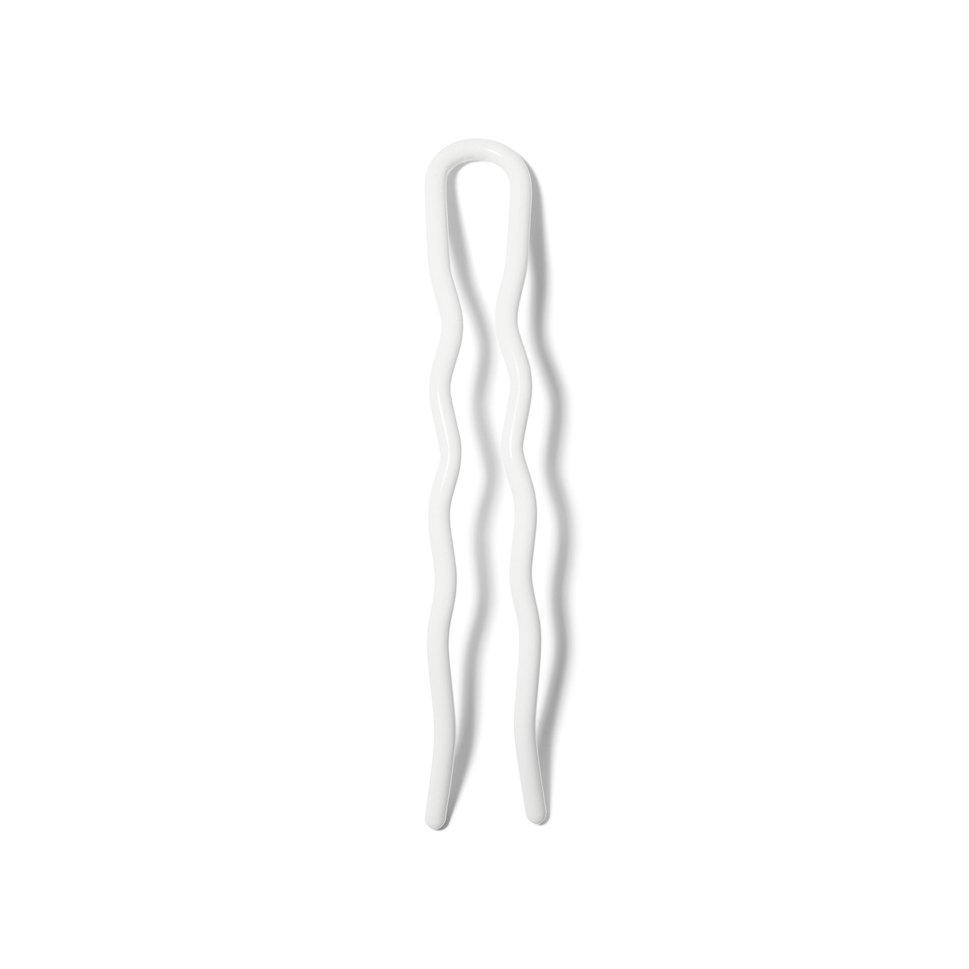 The Reed Clarke 4" Hair Pin with a  white powder coated finish. The tines have soft waves in them for grip.