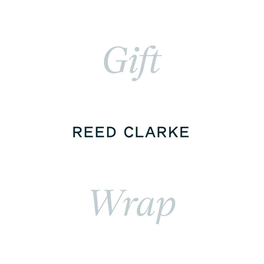 Blue and black text on a white background that says Reed Clarke Gift Wrap.